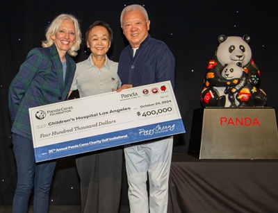 Andrew and Peggy Cherng Presenting Check to CHLA
