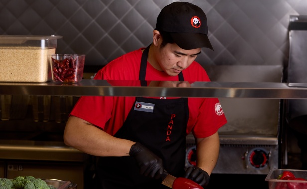 Panda Express Associate Cutting Vegetables